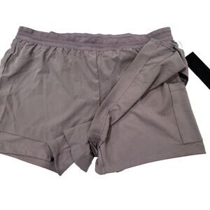 Mono B double layered shorts in Large. New with tags! Running /exercise built in